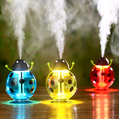 The luminous Mini cartoon humidifier purifier home fragrance