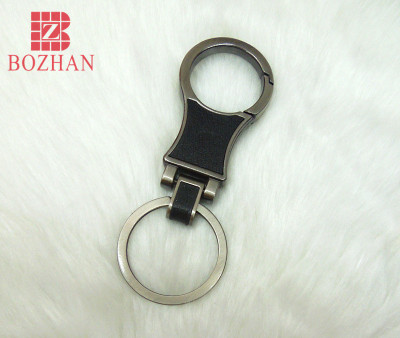Special atmospheric round button gun color alloy key chain