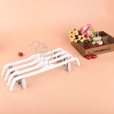 High - grade white imitation plywood plastic solid trousers rack white plastic clothes rack clothing store special.