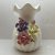 Ceramic vase arts and crafts placed pieces of small expressions using white porcelain waterproof multi - colored flowers, big belly flower expressions using