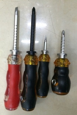 Three screwdriver with a screwdriver transparent handle screwdriver