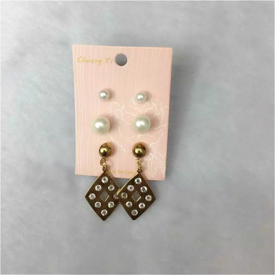 Lovely delicate pearl two white diamond earrings on temperament alloy