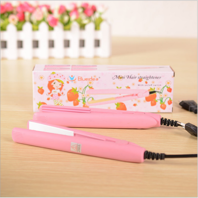 Mini pink hair straightener corn clip with bangs and electric clippers