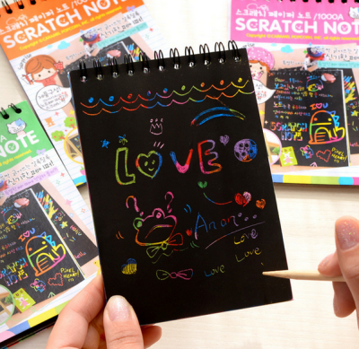 The graffiti DIY cartoon sketch painting colorful scratch children surprise the magic of this new product coating