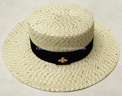 The new flat top hat style is a simple and generous beach hat.