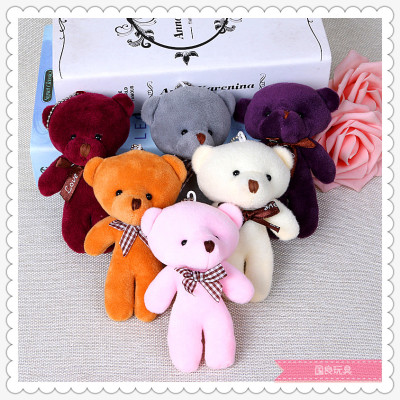 The manufacturer 's 11 cm bag is hung with a plush bear bear' s big head bow tie