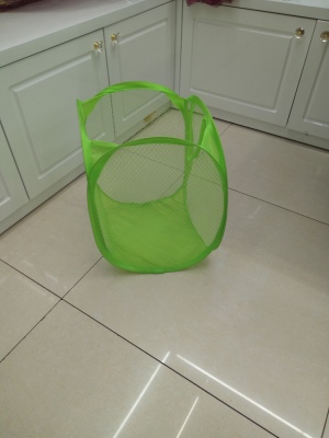 Beautiful green laundry basket.