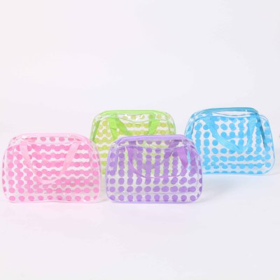 The lady's transparent spotted handbag is easy to carry and can easily carry a small cloth bag