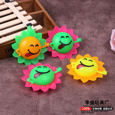 Hot selling smiley face sunflowers glow hair ball flashing, call ball seven color sound massage ball.