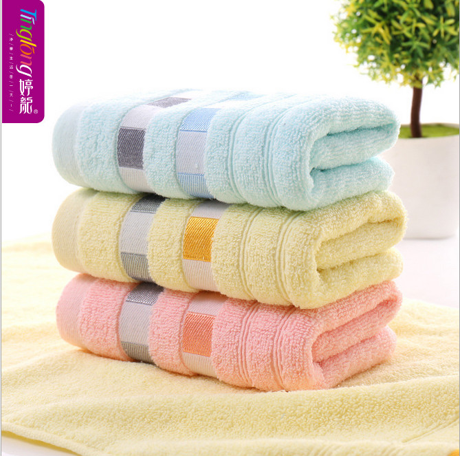 婷龙厂家直销纯棉丝带格超高性价比毛巾跑量毛巾