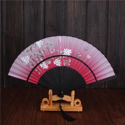 The factory sells high quality silk spot hot sell two sections a silk fan lady fan wholesale
