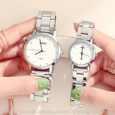 New meters can watch simple retro big dial steel band waterproof couple men and women on the table