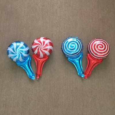 There are a variety of hand - held balloons.