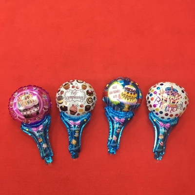 There are a variety of hand - held balloons.