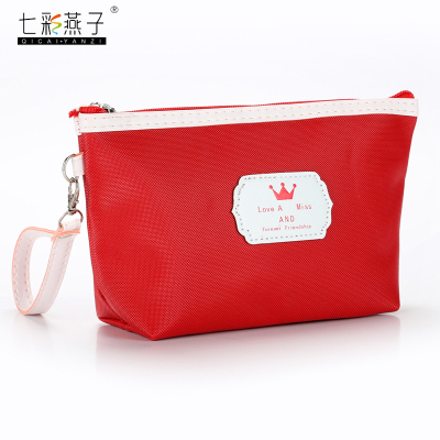The new pure color cosmetic bag crown handbag customized LOGO manufacturer direct sales.
