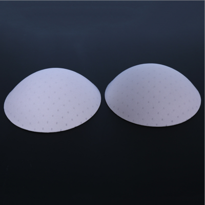 Manufacturer's drill in custom producing circular perforated chest gasket inserts comfortable bra underwear sponge cup chest gasket