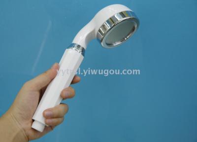 White nozzle, plastic shower head