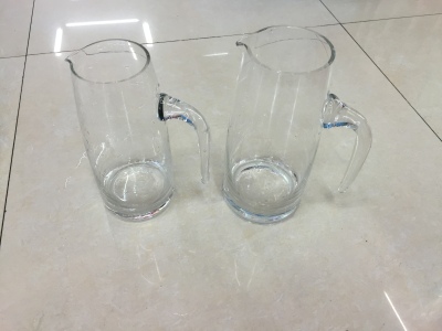 Transparent glass with handle with handle.