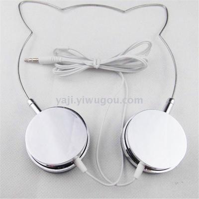 Rose gold plated cat ears with plug - in earphones.
