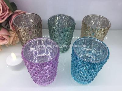 Electroplated broken silver embossed bead glass candlestick