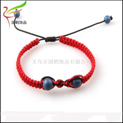 Red String sarcandra woven beaded bracelet