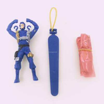 Sea and land parachute soldiers present small toys.