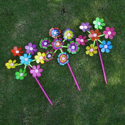 Taobao sells colorful flower cartoon windmill seven flowers ferris wheel plastic windmill children outdoor toys