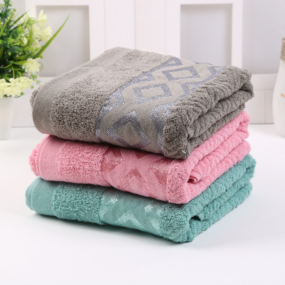 Pure cotton thickened jacquard lozenges towel gift towel soft and comfortable.