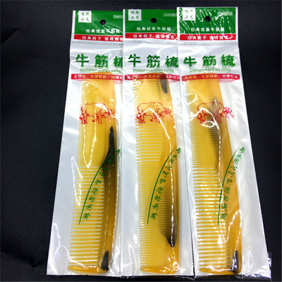 Compact double - end dense - tooth wide - tooth without handle comb folding non - woven 2 yuan shop goods