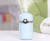 Cute baby negative ion car air freshener, USB mini household desk, seven color light humidifier.