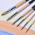 Xinqi painting material manufacturers direct luomao head watercolor gouache line special brush