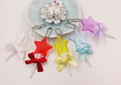 Resin star pendant with star candy cane ornament