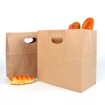 Takeaway bags dig hole bag kraft paper Shouwan Dai portable paper bag can be printed LOGO