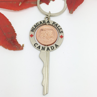 Canadian maple leaf coin key chain travel souvenir yiwu factory gift customization