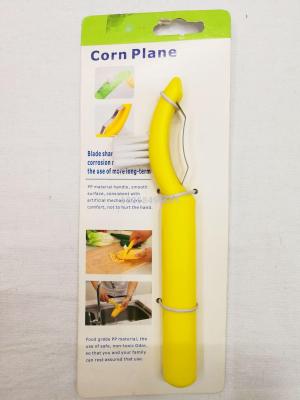 A kitchen peeler with a clean brush corn planer thresher to peel corn to the granulator