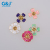 Yiwu oil drop flower glue drop flower environmental protection copper bottom middle hole hand sewing 