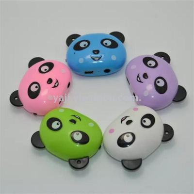 Cute panda plugs in MP3