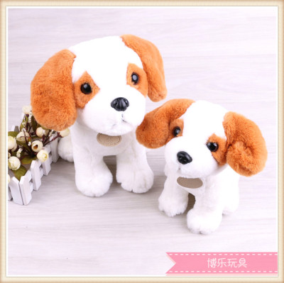 The cute puppy is a stuffed toy with a stuffed toy.