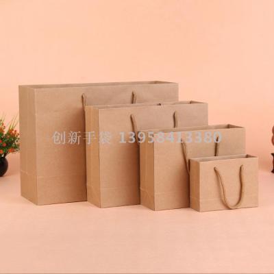 Manufacturers sell hot advertising environmental portable paper bag clothing shopping gift bags custom kraft paper bags wholesale