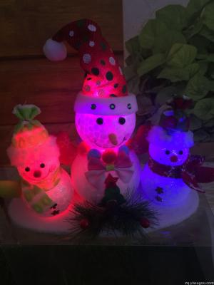 A4-9123 snowman lantern 3 people group