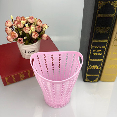 The new shelf creative rattan braid hollow plastic small paper basket bin.