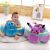 The baby learns to sit in the chair infant safety seat small sofa plush toy.