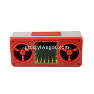 Outdoor ch-m38 portable rectangular 3D light emitting lamp with bluetooth speaker with a small stereo.
