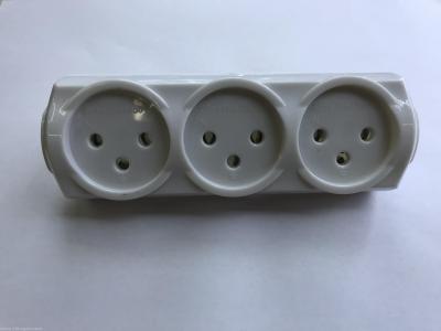 Socket switch with three round French type plugs.