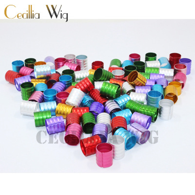 The hair of the wig is wrapped in a ring of colored hollow embossed aluminum ring.