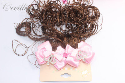 The baby wig is decorated with a little girl's hair, and the girl's hair is pure handmade bow.