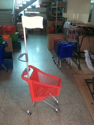 Full plastic with flag child trolley cart.