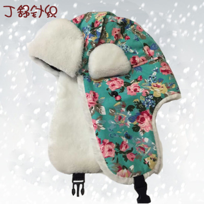 Hot - selling Korean version of the flower cloth small and fresh leifeng hat warm and sweet winter female ear protection manufacturers.