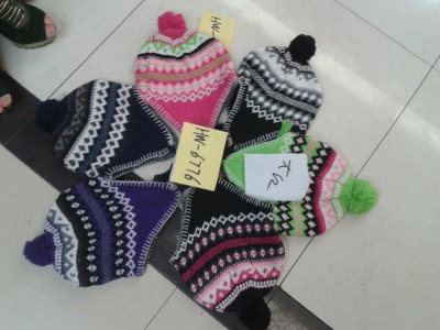 The Children 's ear cap knitting yarn cashmere acrylic jacquard yiwu foreign trade factory tailstock special price.
