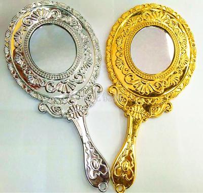 The new hot - selling two - sided handle cosmetic mirror wholesale portable european-style hand-held mirror.